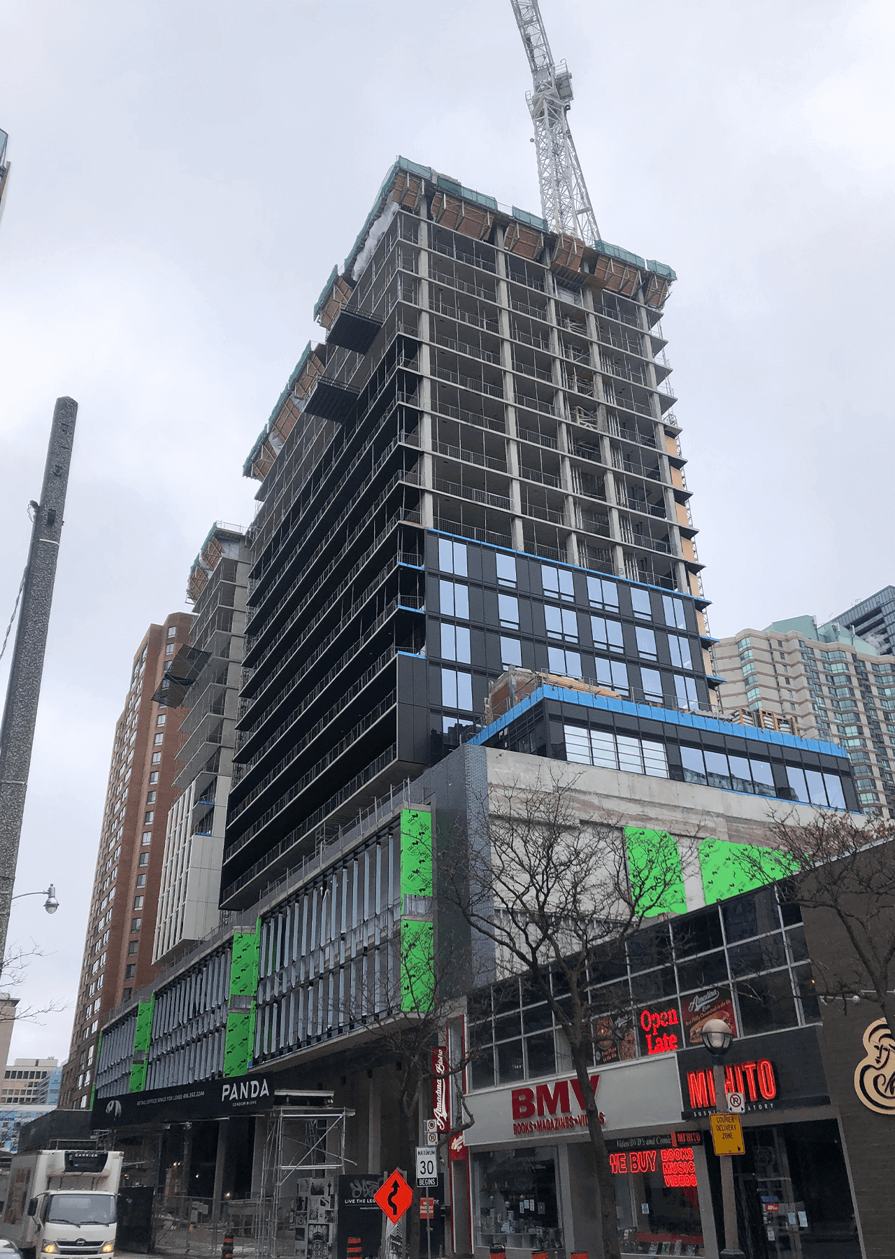 building under construction installing windows